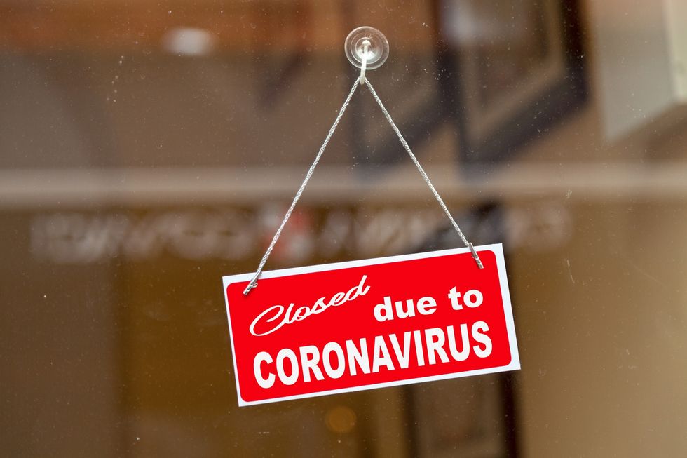 AH APRIL COVER Coronavirus red sign