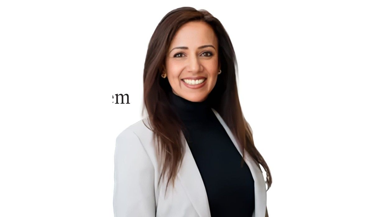 Anu Saxena, President of Hilton Supply Management, speaking at a hospitality industry event, showcasing leadership and diversity initiatives.