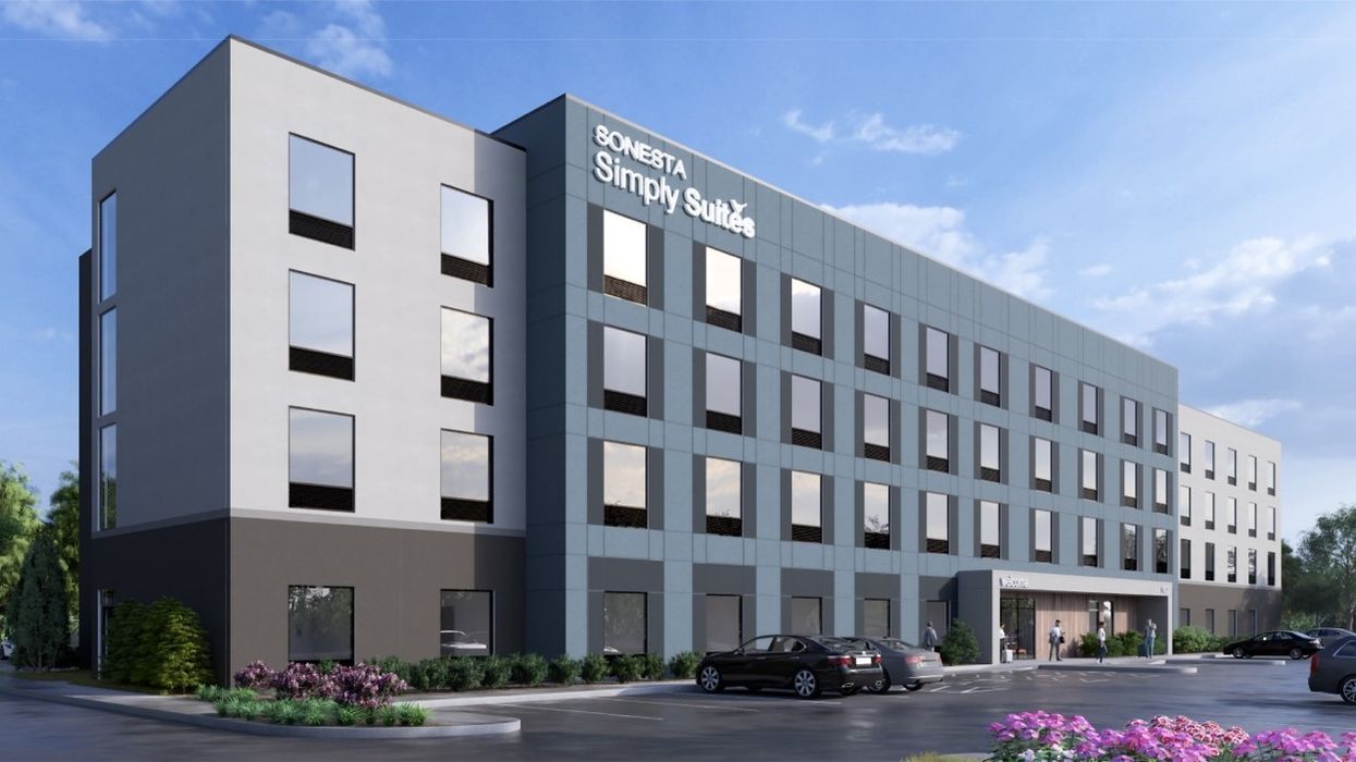 Modern Sonesta Simply Suites prototype with in-suite kitchen and workspace for extended stays