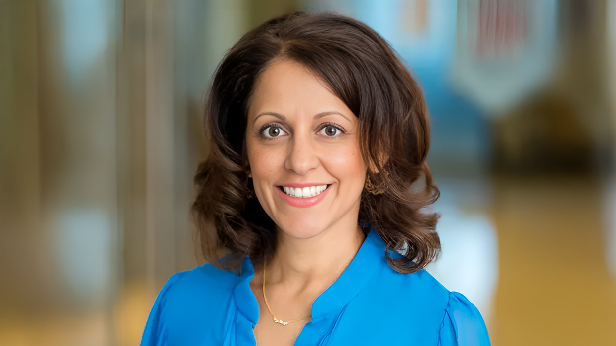 Shruti Gandhi Buckley, Hampton by Hilton global brand leader, at a Hilton event, advocating for diversity in hospitality.