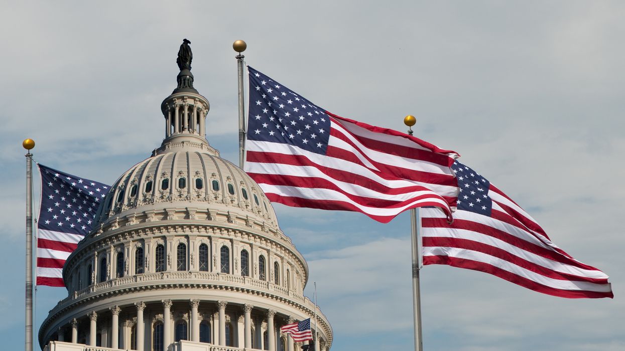 U.S. Capitol with flags representing U.S. hospitality industry 2025 policy changes