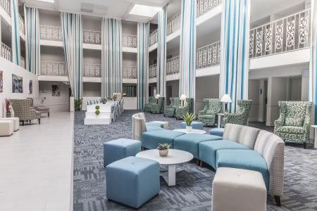 the_atrium_lobby_of_the_50-room_the_blu_today.__medium The atrium lobby of the 50-room The Blu, a boutique hotel in Blue Ash, Ohio, opened in October after undergoing extensive renovations and repositioning from a branded midscale hotel.