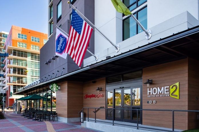 ENEWS-COVID-07-26-21-Noble-acquisition-Exterior-with-Starbucks-696x465