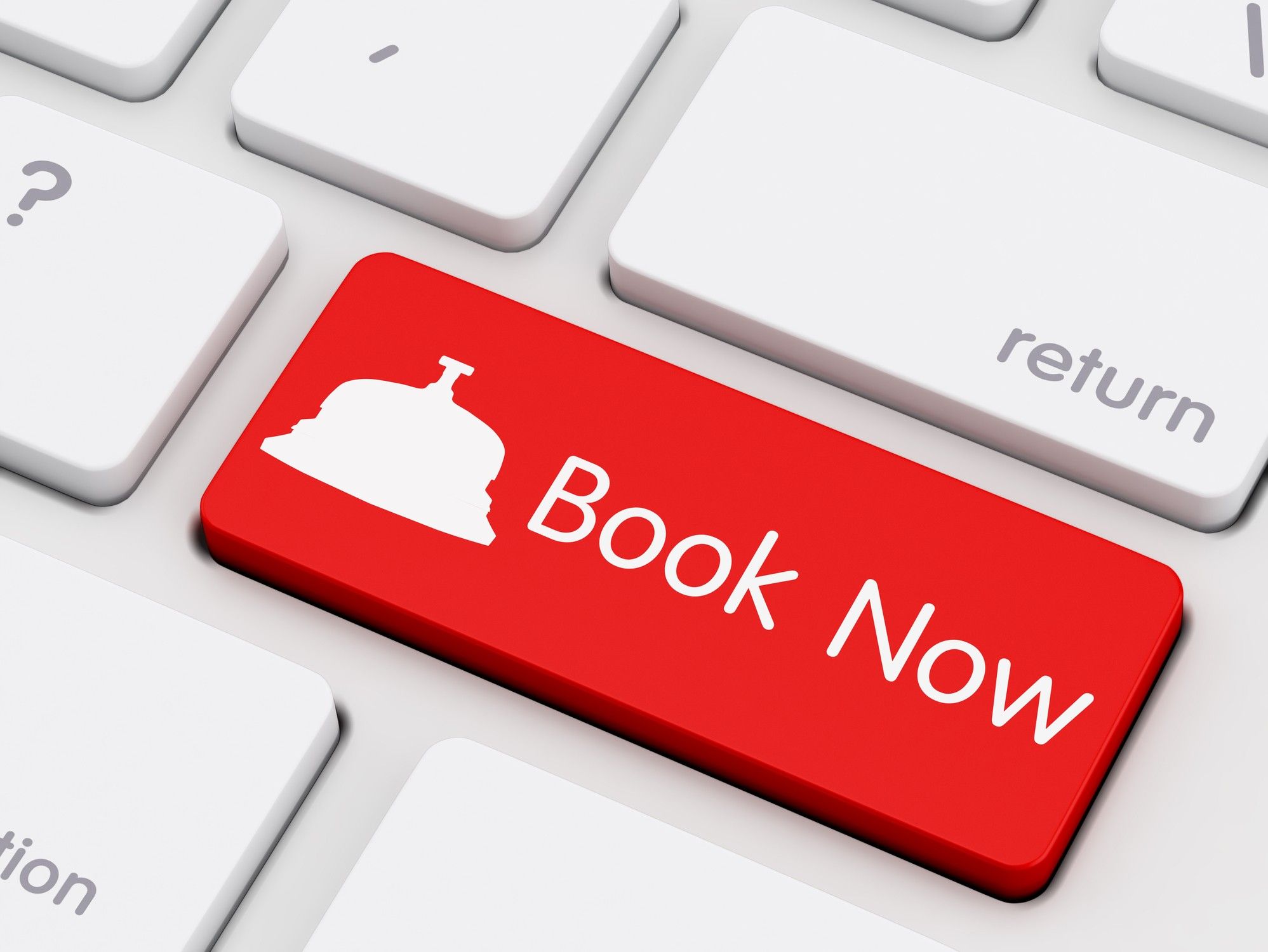 Book Now written on keyboard key Getaroom reservation system