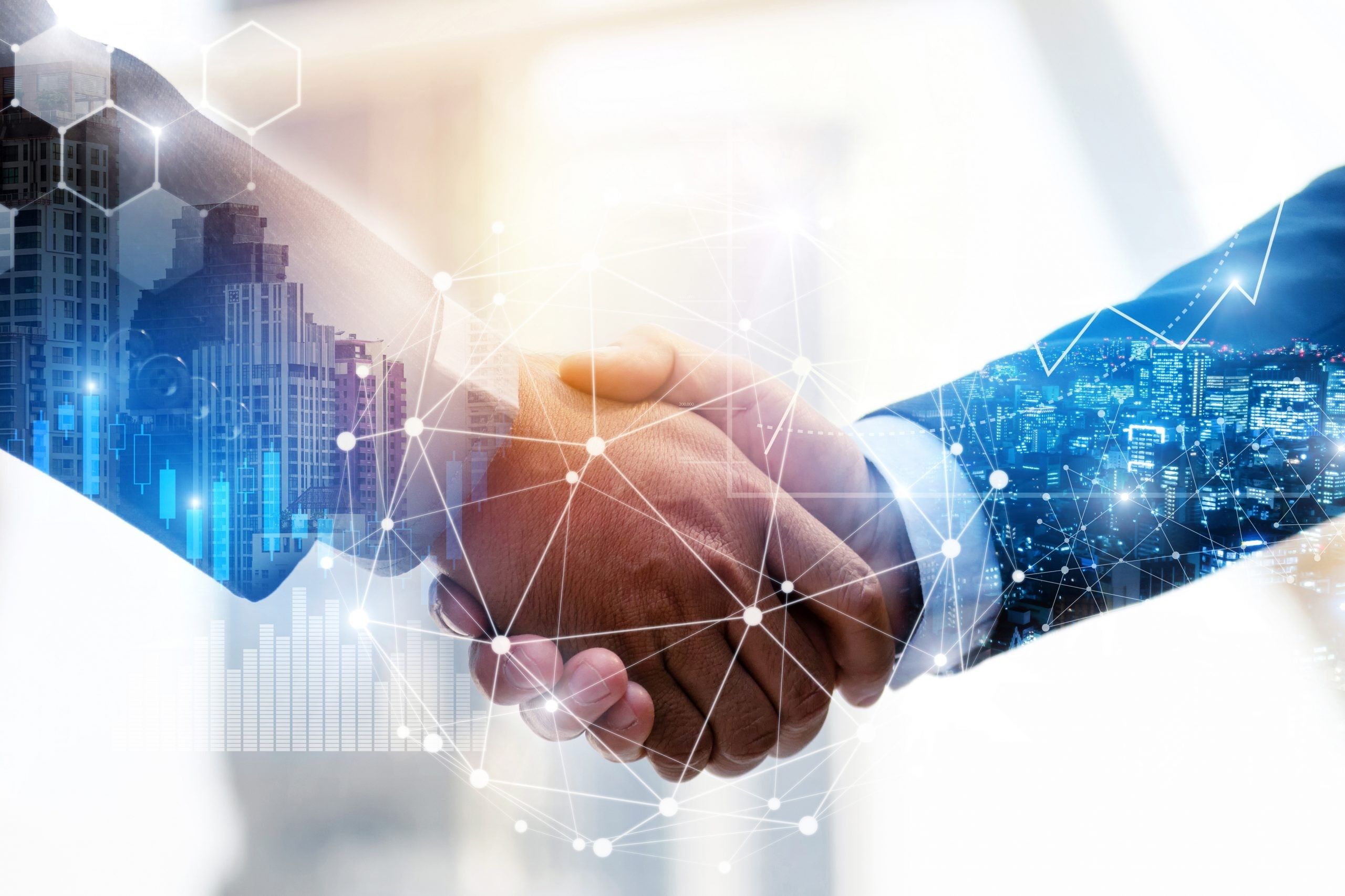 Business Partnership. business man investor handshake with effect global network link connection and graph chart of stock market graphic diagram, digital technology, internet and partnership concept AHLA, HSMAI Americas partnership
